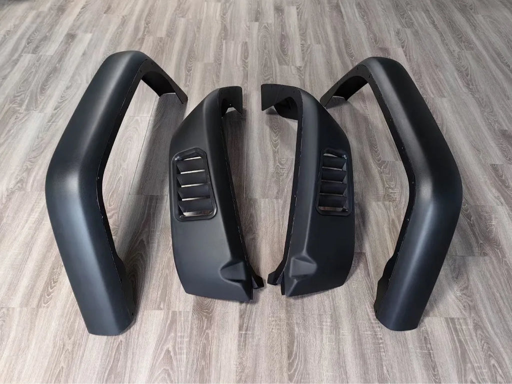 Black plastic car wheel arch set of four for universal fit on automobiles