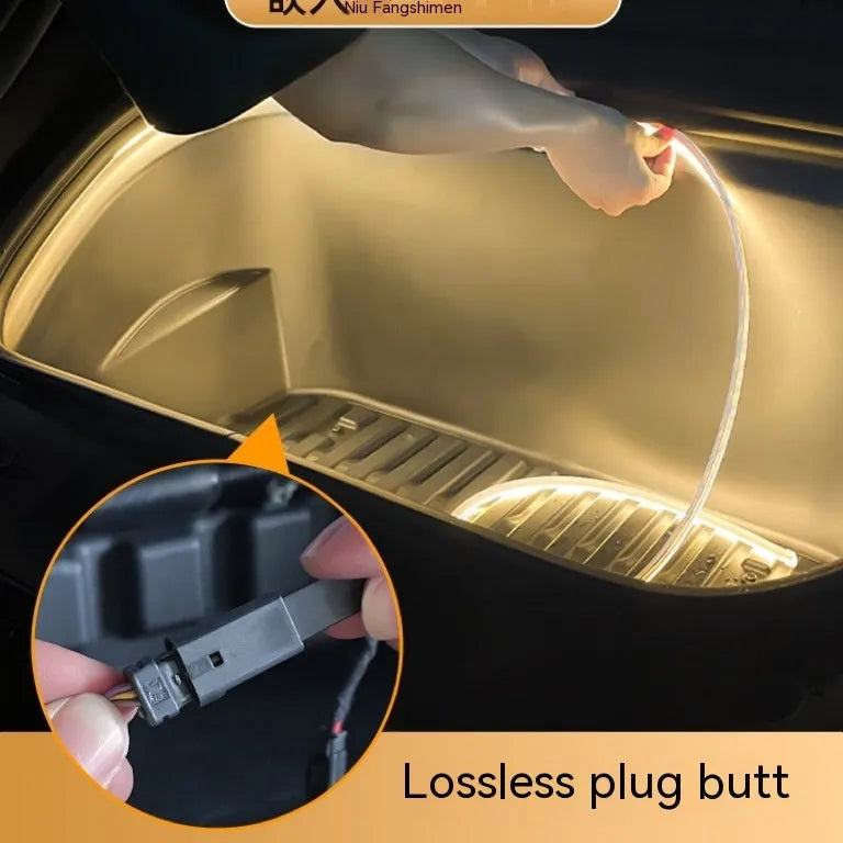 Tesla Model 3 and Model Y front footwell ambient lighting kit with soft silicone light bar in three colour options