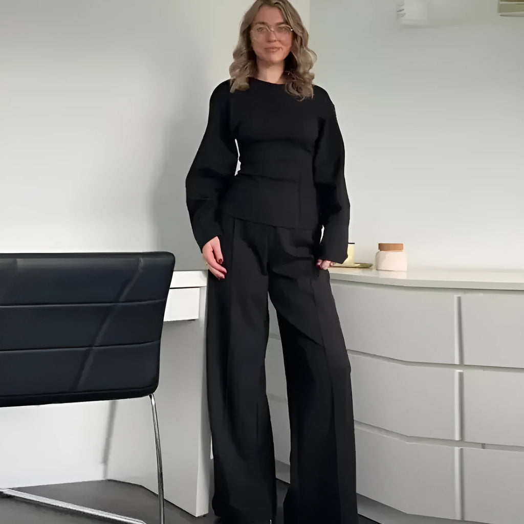 Women's black polar fleece suit set with pleated long sleeve top and wide leg trousers