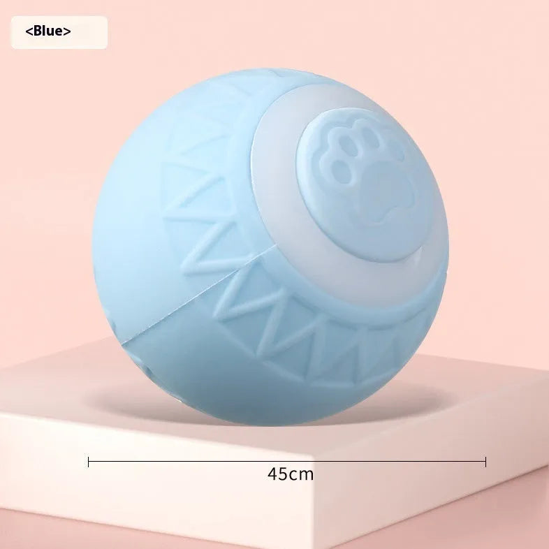 Blue rechargeable automatic bouncing ball smart toy for indoor cats on a floor.
