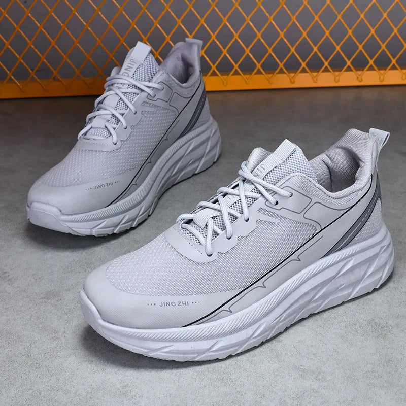 Men's black thick-soled anti-skid lace-up running sneakers with round toe and rubber sole on grey background