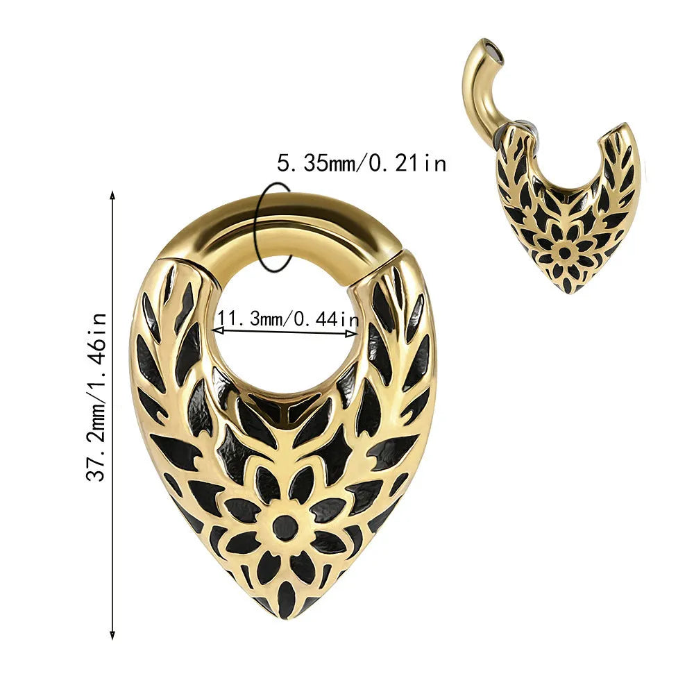 A stainless steel drop-shaped ear extender with totem detailing, shown on a plain background.
