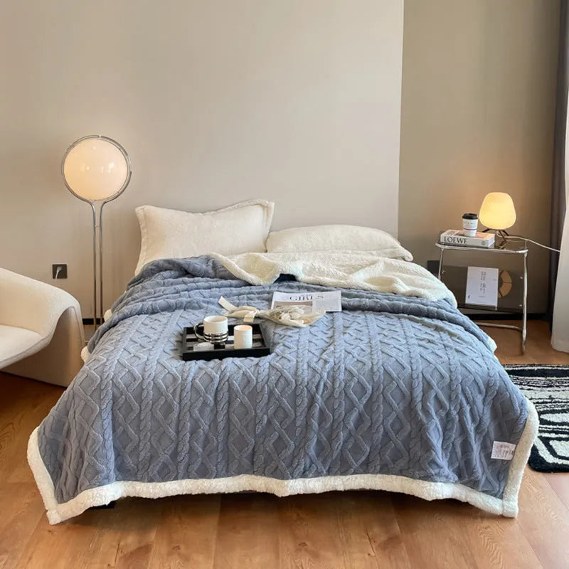 Polyester winter thermal flannel blanket in beige, laid flat showing its texture and simple modern style.