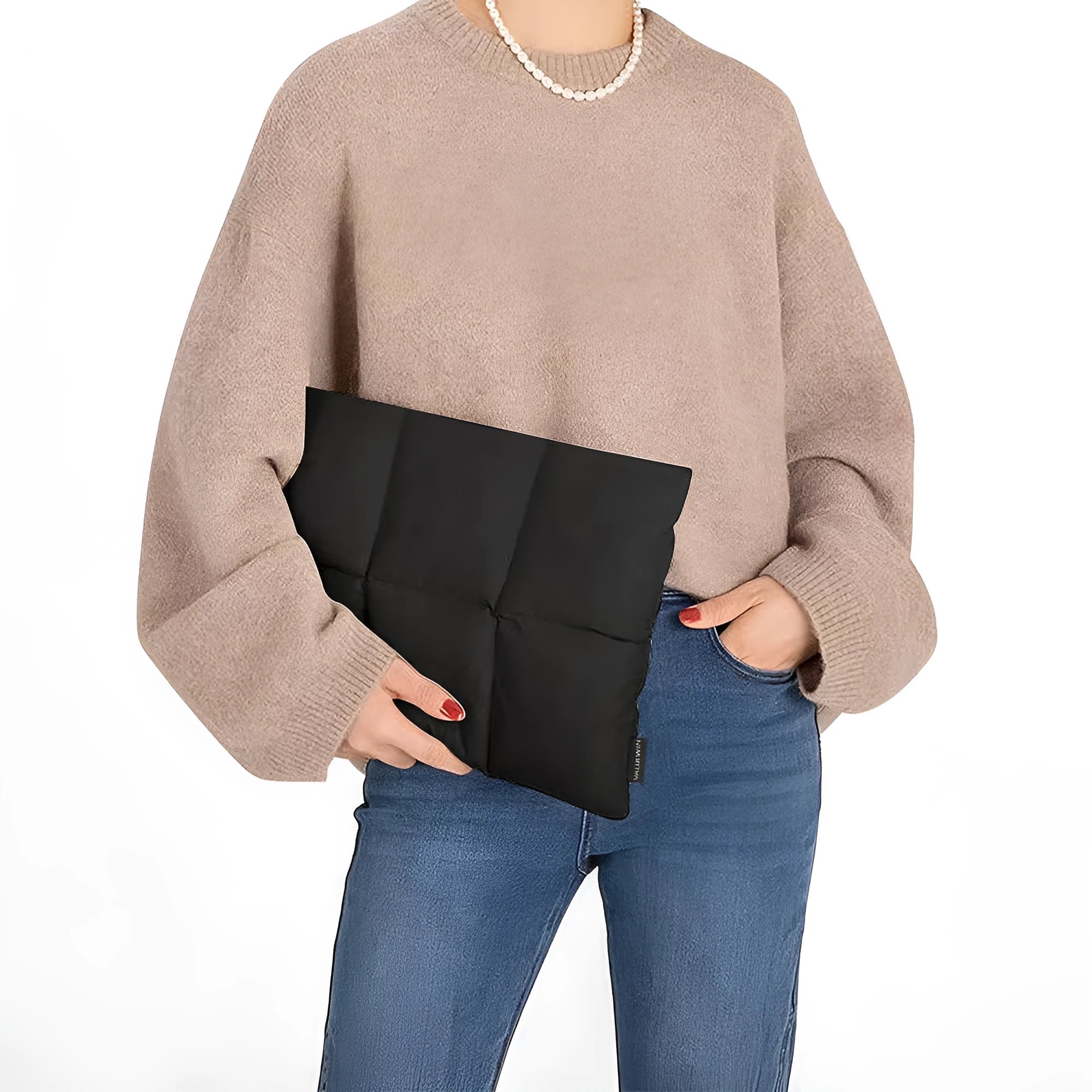 Soft black retro-style laptop sleeve for 13 to 15.6 inch laptops on a table.