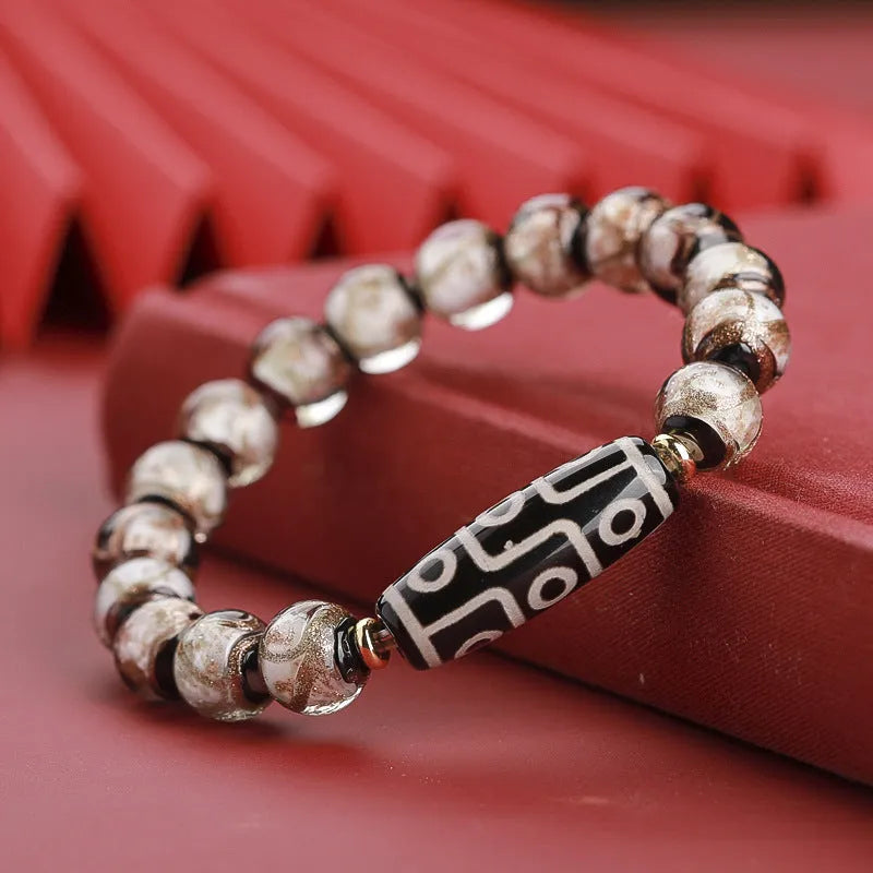 Chinese-style five-colour glaze bracelet with snake motifs and manual beadwork.