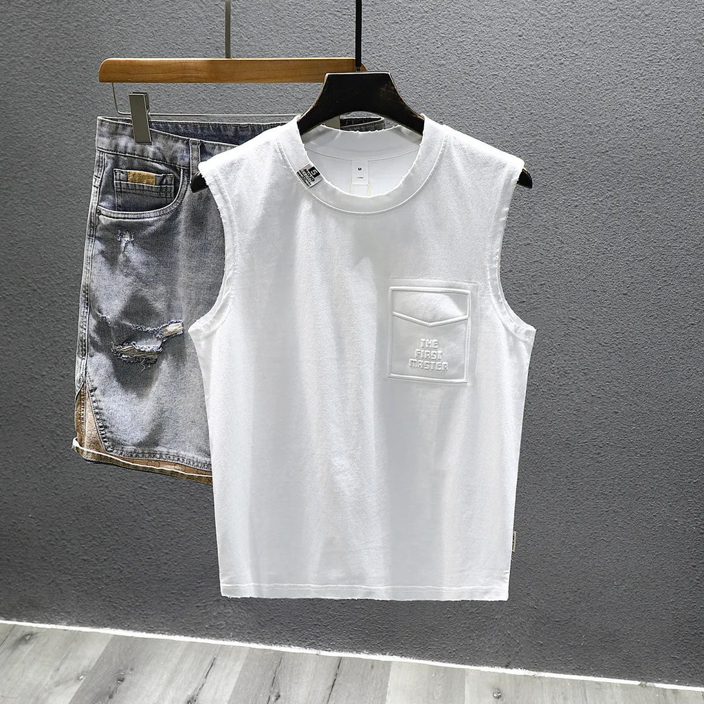 A solid colour loose-fitting cotton sleeveless T-shirt with a straight hem, shown in white.