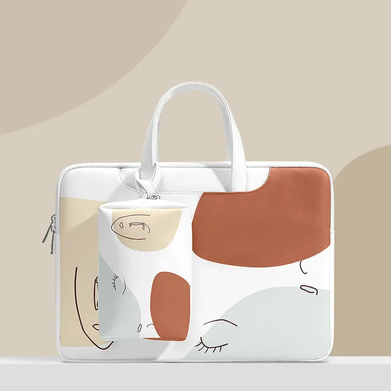 Blue PU leather laptop bag for girls with a soft handle and zipper opening.