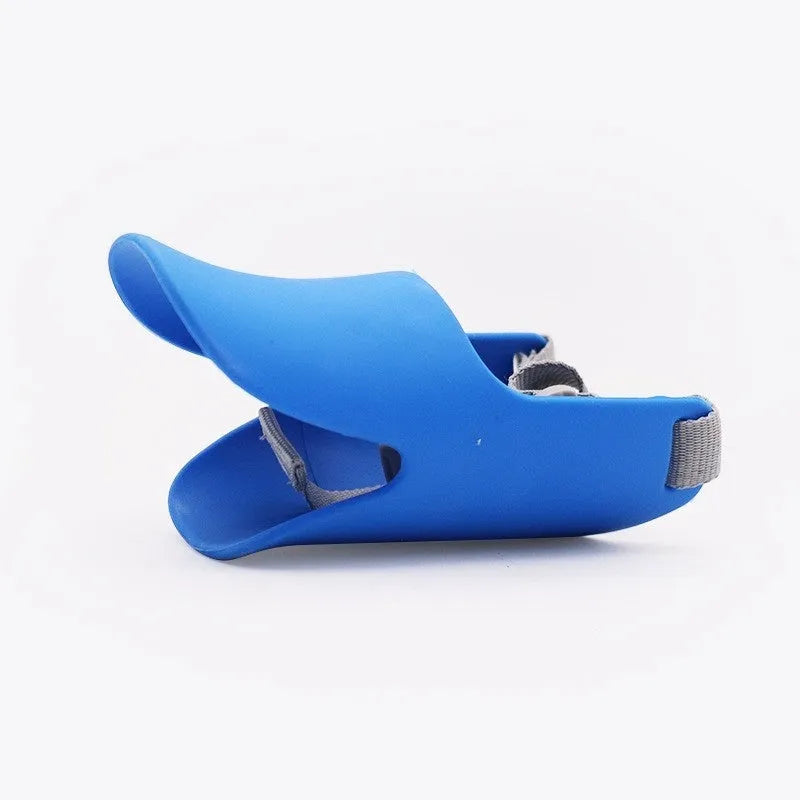 Blue TPR dog duckbill muzzle mouth cover for small to medium dogs, side view on light background