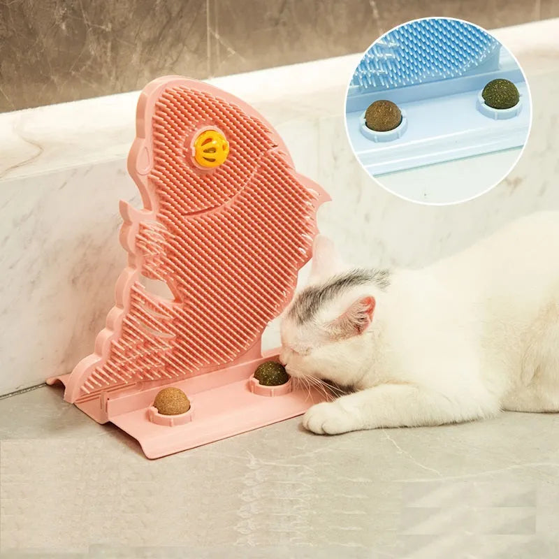 Blue fish-shaped plastic cat wall scratcher with self-grooming brush, catnip balls and mini bell