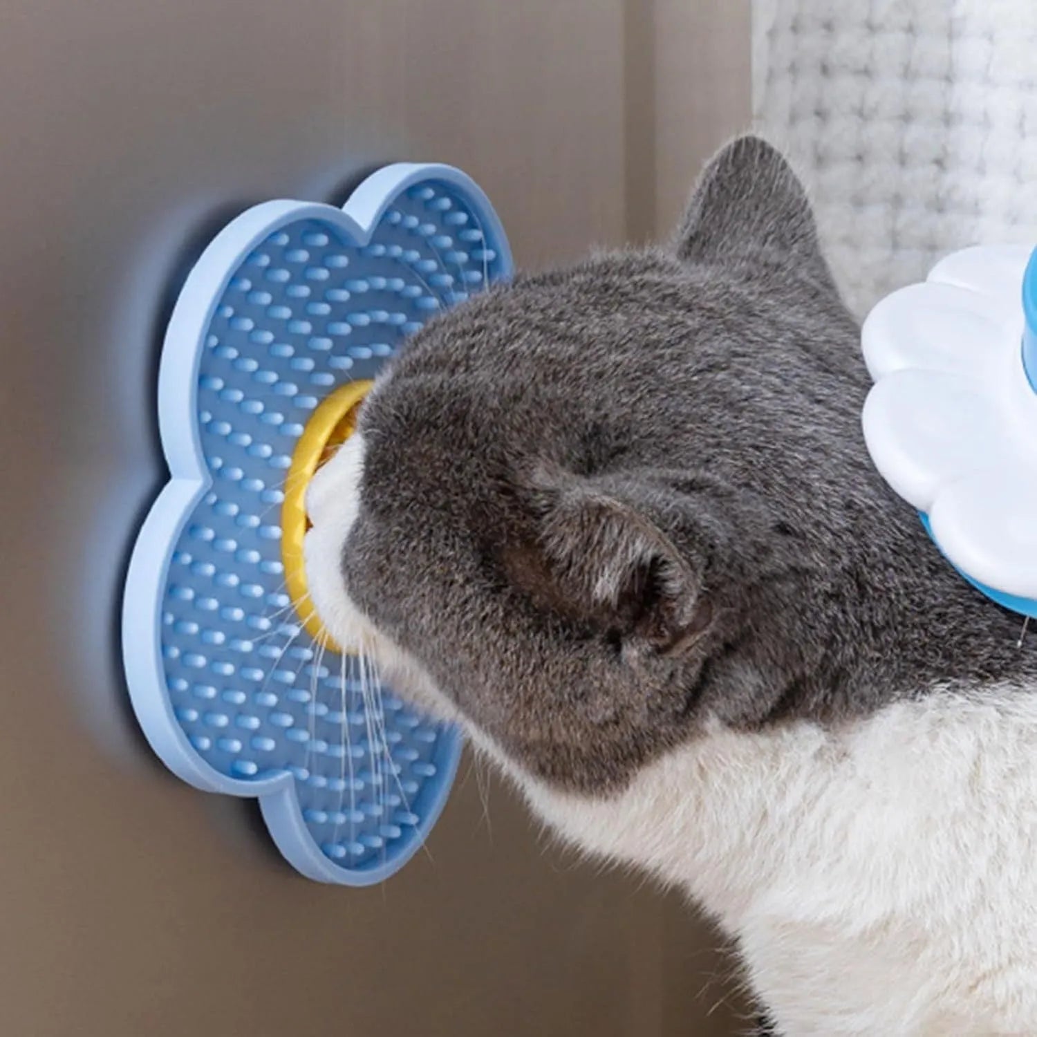Grey flower-shaped silicone pet lick mat with suction cups for slow feeding