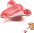Blue interactive pet puzzle toy with bell and catnip attachments on smooth floor surface