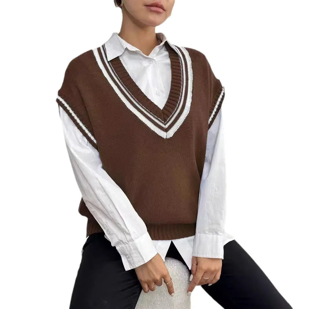 Women's loose blue college-style wool vest sweater, acrylic polyester blend, front view.