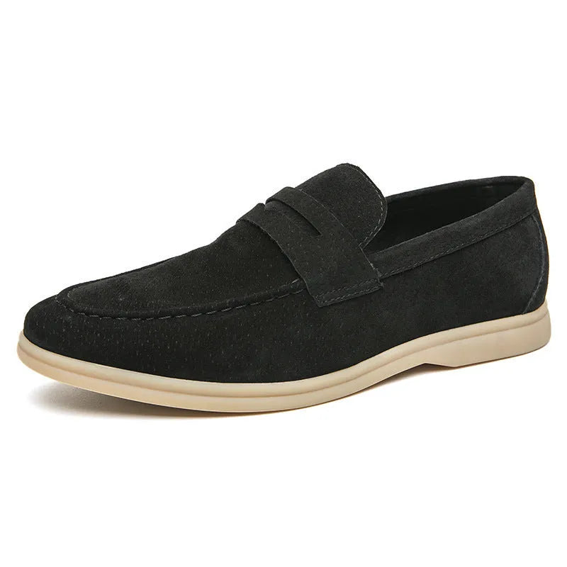 Men's black leather slip-on casual shoes with a round toe and rubber sole on a white background.