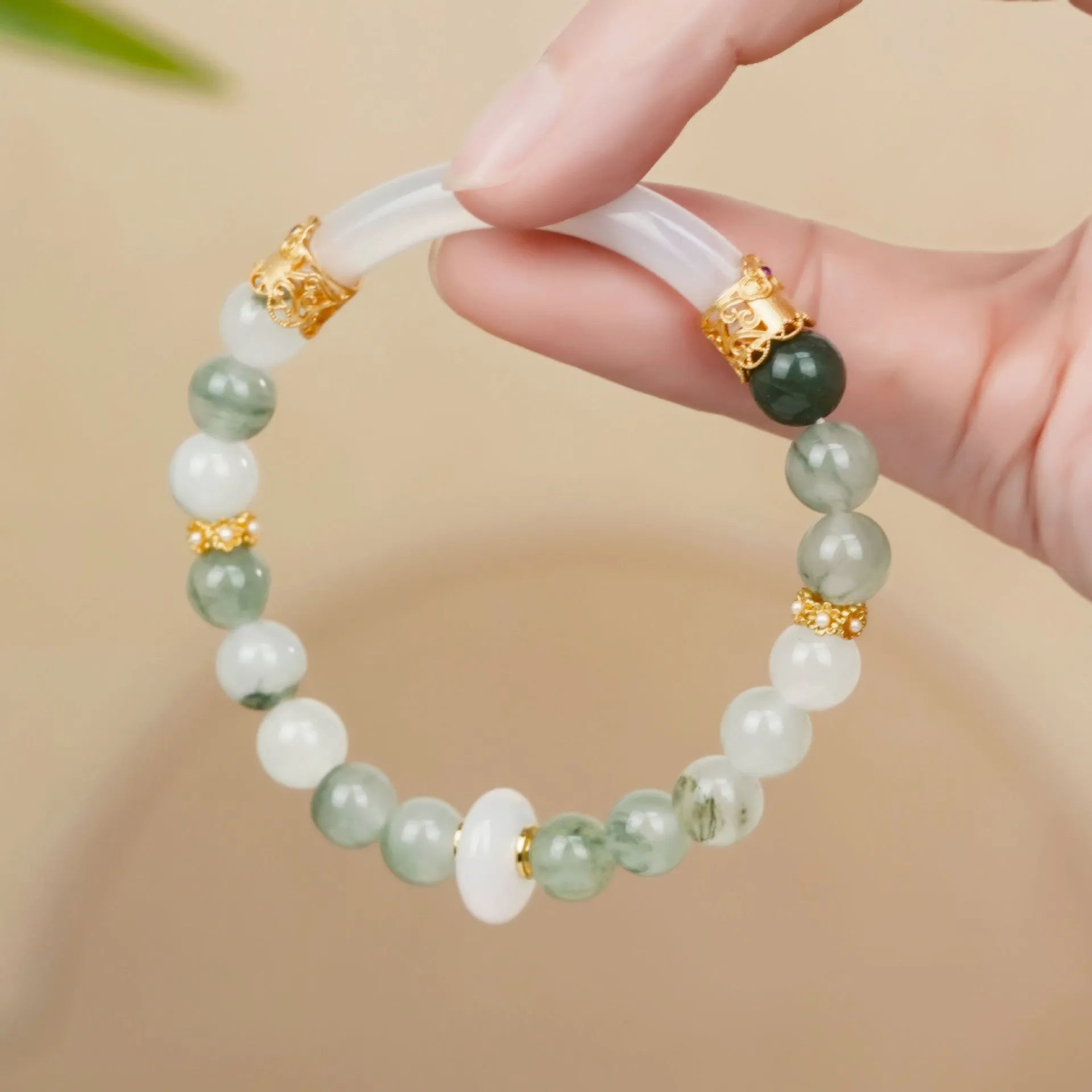 Emerald green Tian Shan Cui women's bracelet with floating flower girl design and round elements