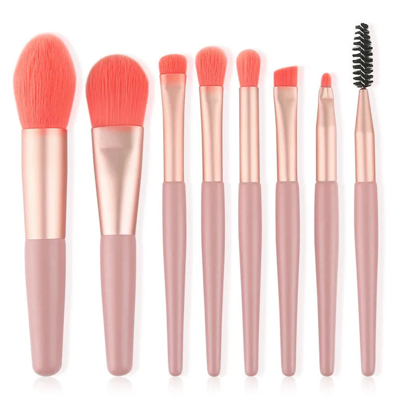 8-piece Morandi makeup brush set with fibre hair bristles in pink, blue, apricot, and green on a light background