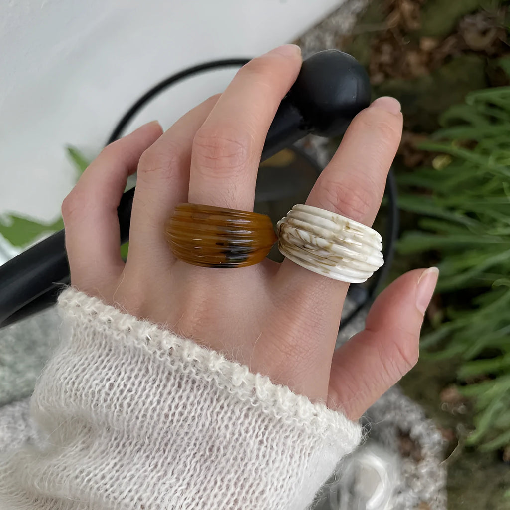 Chinese style geometric resin ring in irregular wide band shape showing three colour options