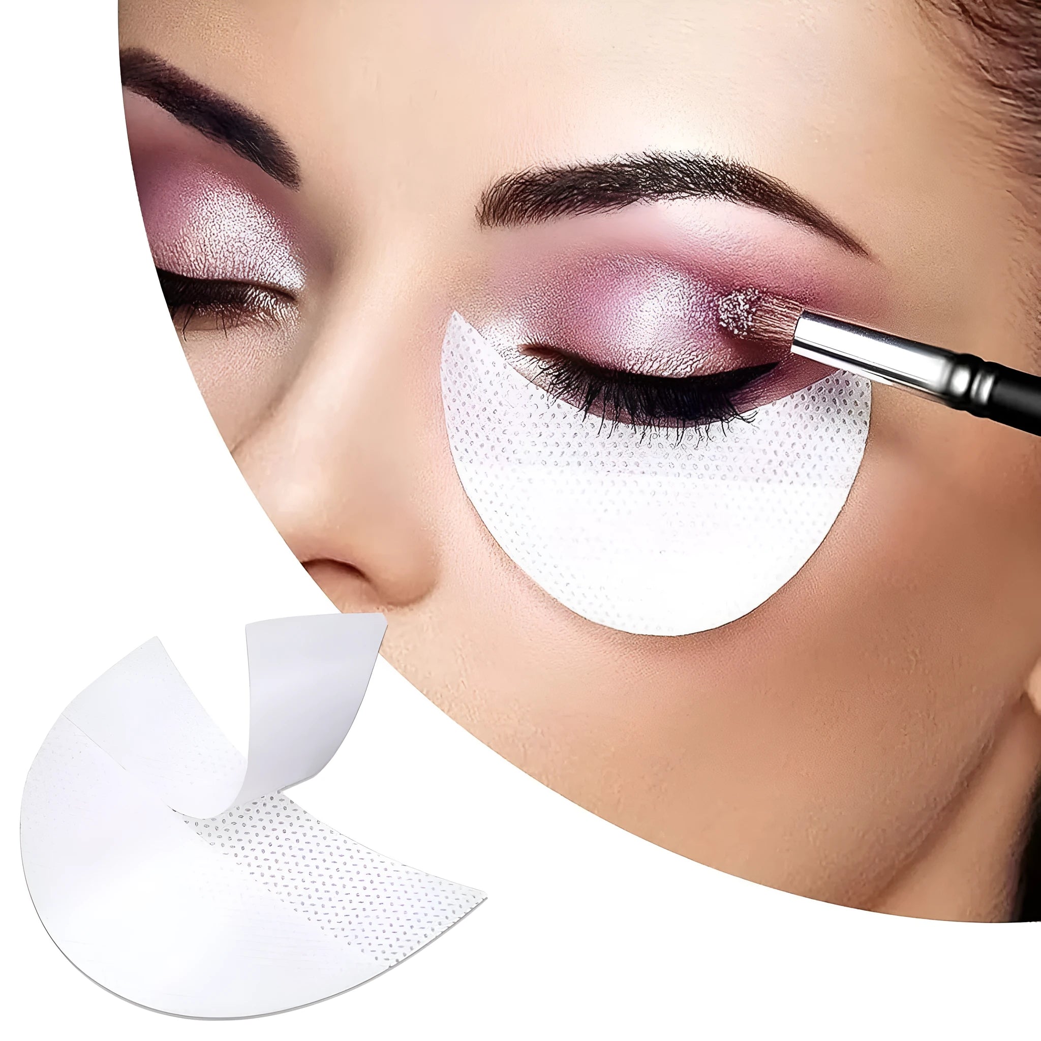 Pack of half-moon shaped disposable under-eye makeup shields on pink background