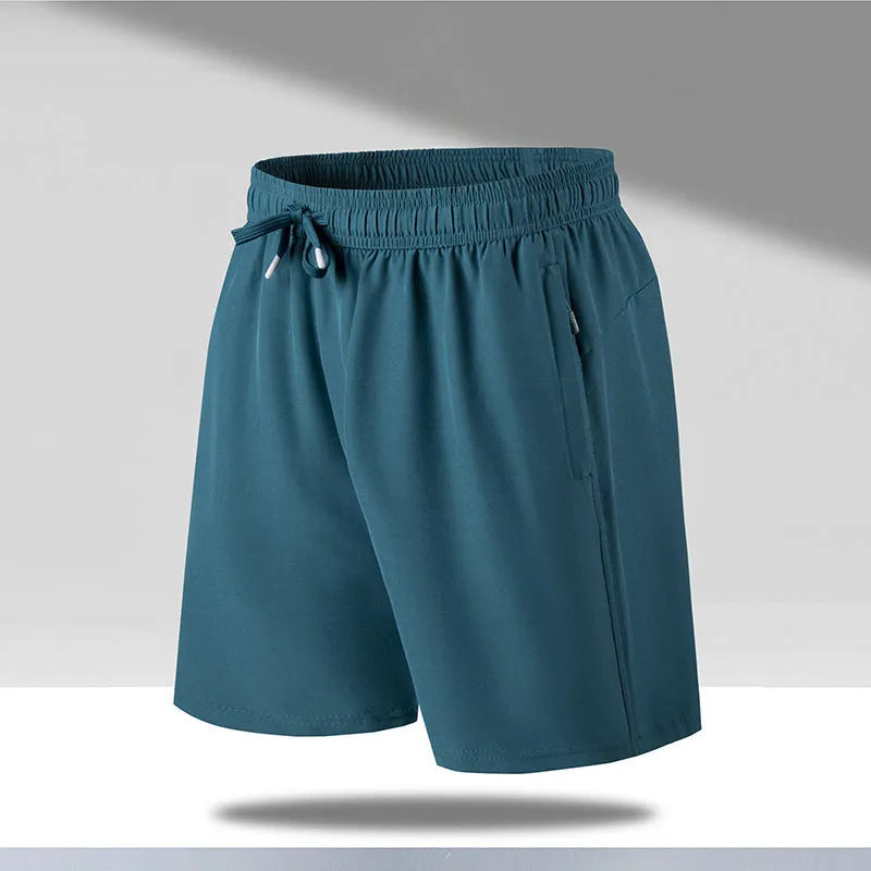 Man wearing loose fit quick-dry polyester beach shorts in a summer colour