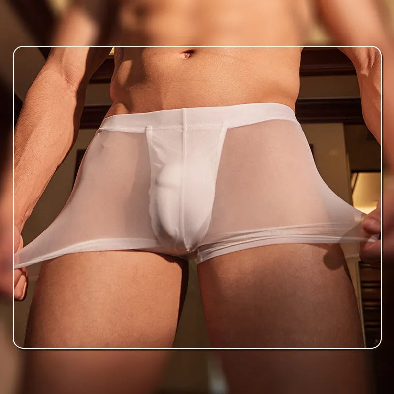 A pair of men's black ultra-thin nylon boxer briefs laid flat, showing free-size fit.