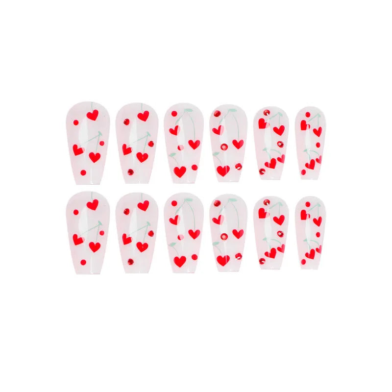 Set of 24 red cherry and diamond shaped nail art decorations for French manicure designs.