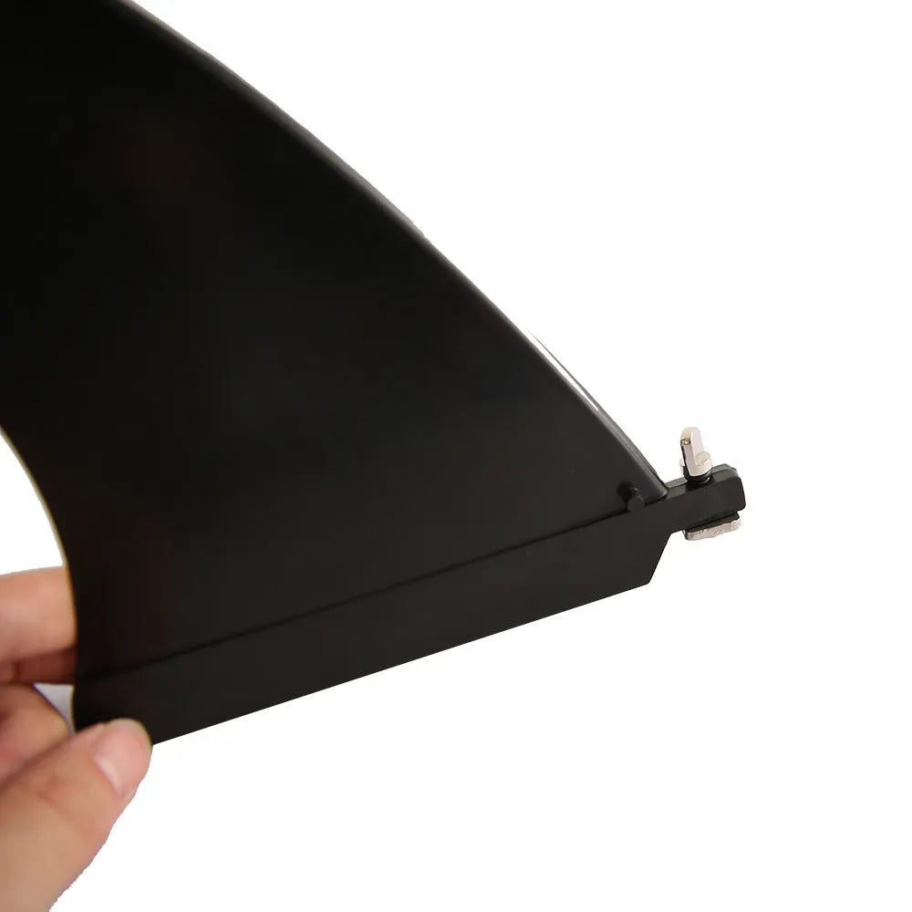 Black plastic SUP paddle with large removable fish fins for water propulsion.