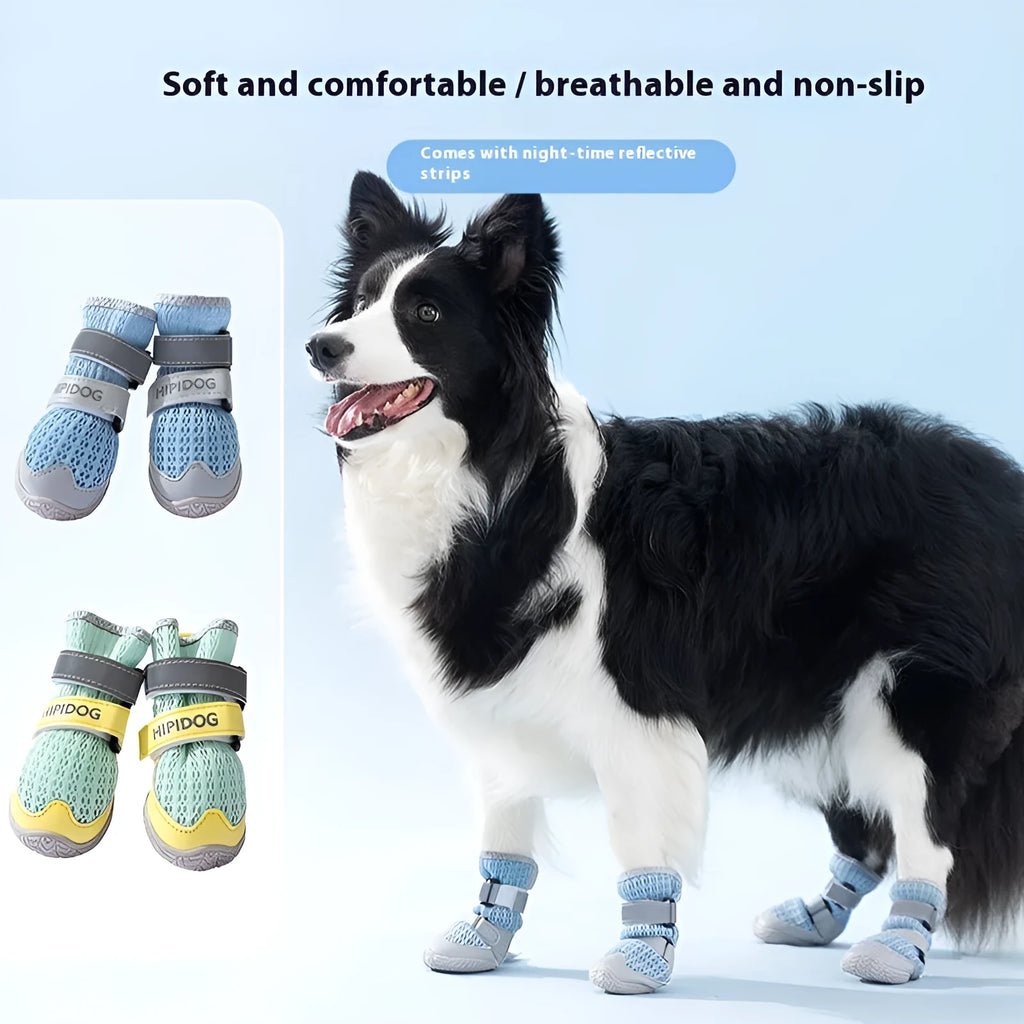 Pair of blue cartoon-style dog shoes with breathable PU uppers and anti-scald soles on a wooden surface.