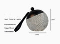 Small cylindrical portable LED night lamp with a touch dimmer in a choice of five colours.