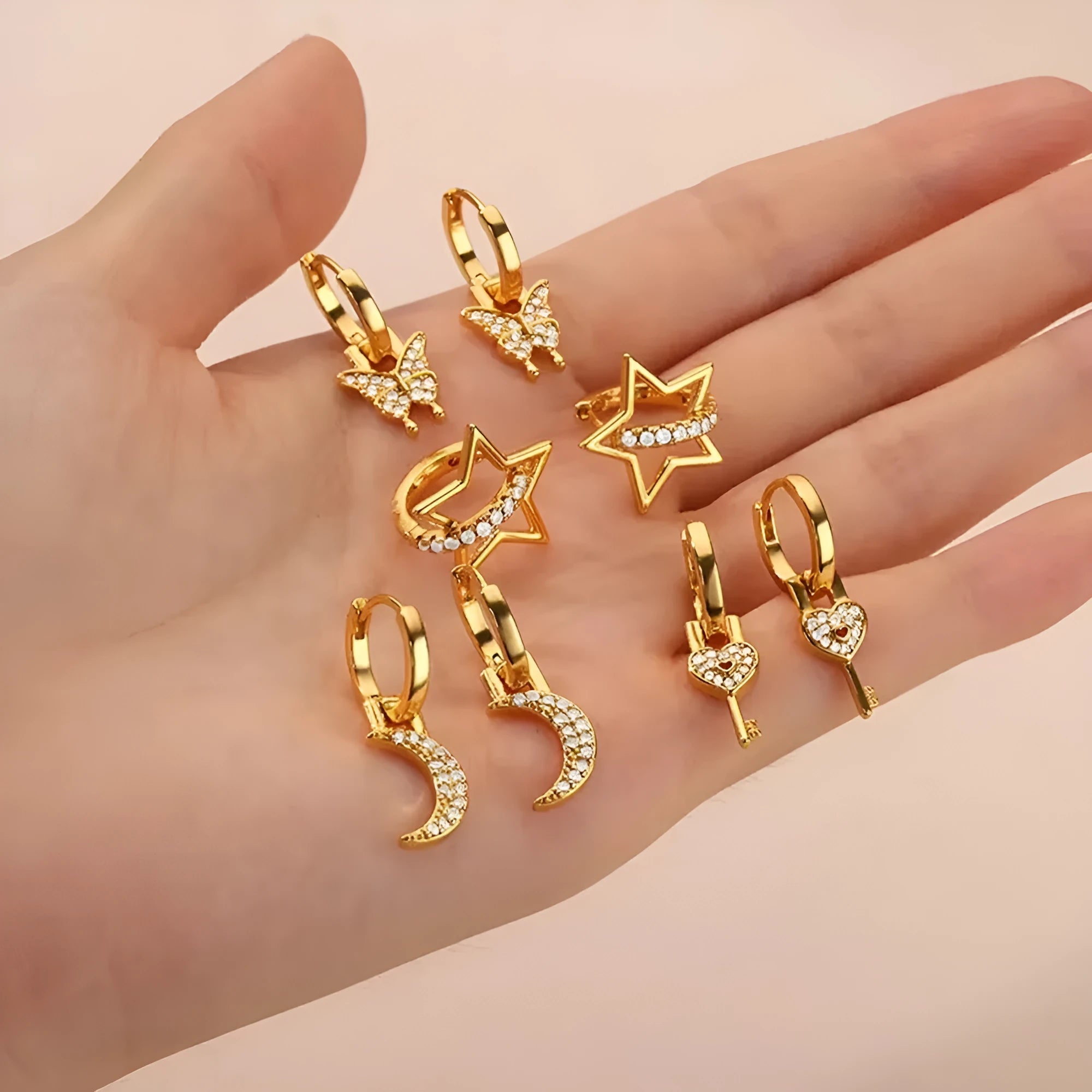 Women's geometric butterfly earrings with diamond treatment in copper with heart and star shapes