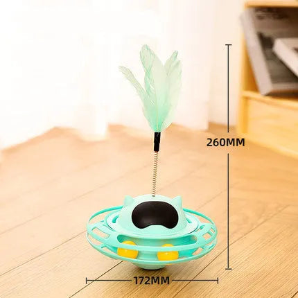 Pink cat tumbler turntable toy on a floor for feline self-play
