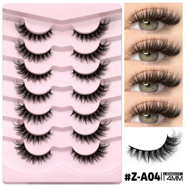 Box of natural false eyelashes with thick artificial fibre lashes and included glue tube