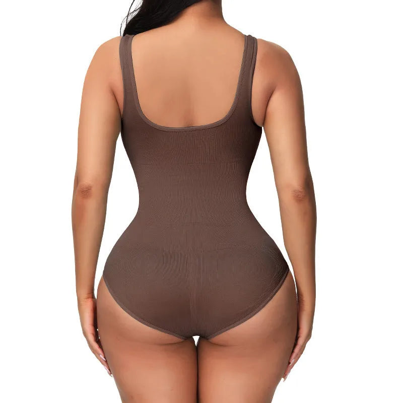 Seamless nylon bodysuit for women in apricot colour on a hanger