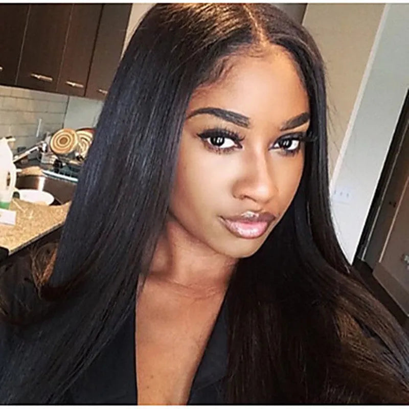 Women's long straight black synthetic wig with centre-part and bangs on a mannequin head