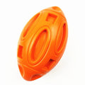 Blue, green, and orange natural rubber squeaky dog chew ball with surface grooves.