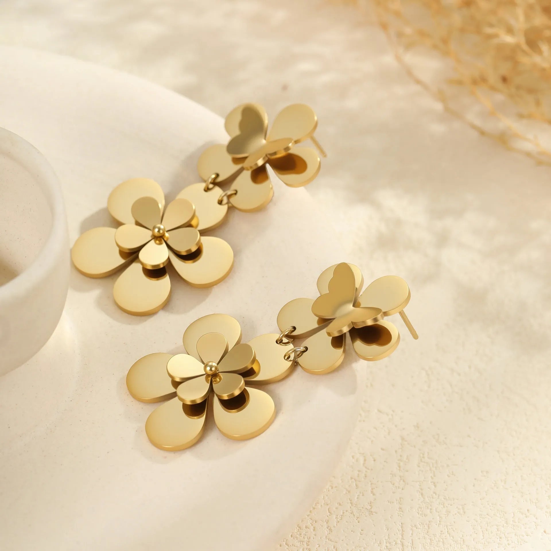 Gold flower butterfly stainless steel earrings for women with geometric details