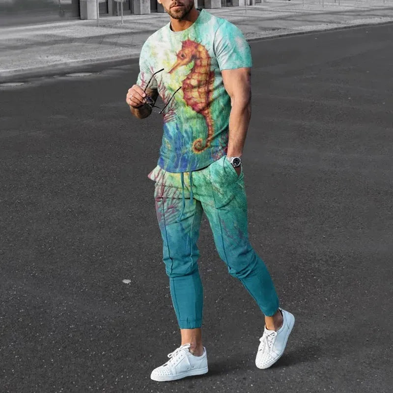 Men's thin short-sleeve printed pullover and matching trousers tracksuit set on a hanger.