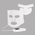 Black and white LED light therapy face mask with controller for home skin treatment.