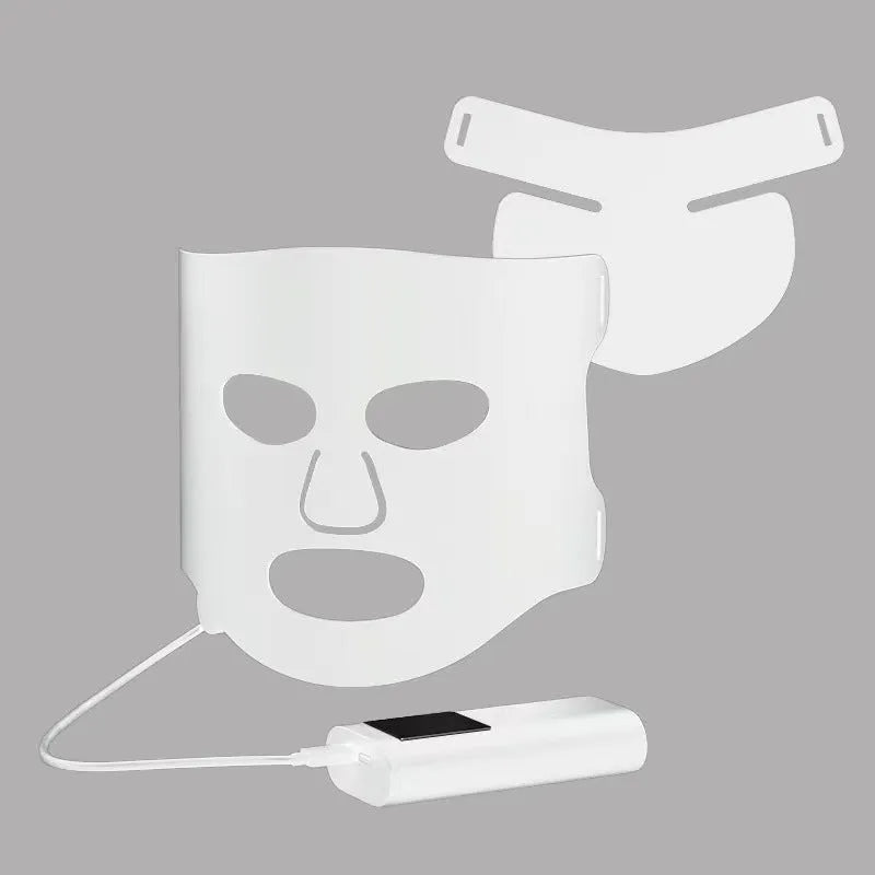 Black and white LED light therapy face mask with controller for home skin treatment.