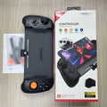 Black and white portable Nintendo Switch gamepad handle attached to console showing controls and Type-C port.