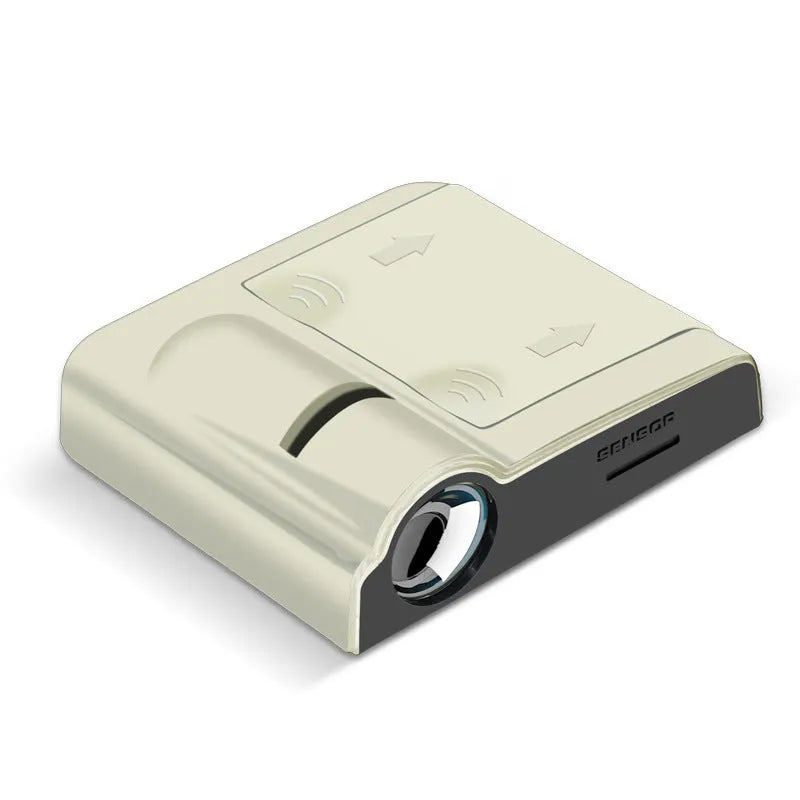 Black and beige ABS plastic car decorative projection lamp showing compact size.
