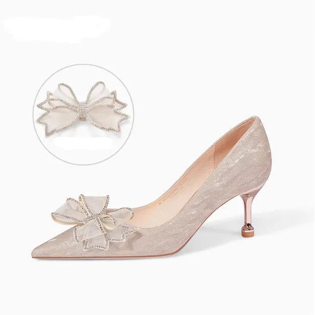 Women's champagne gold sequined pointed stiletto heel pumps for weddings, shown on a plain background.