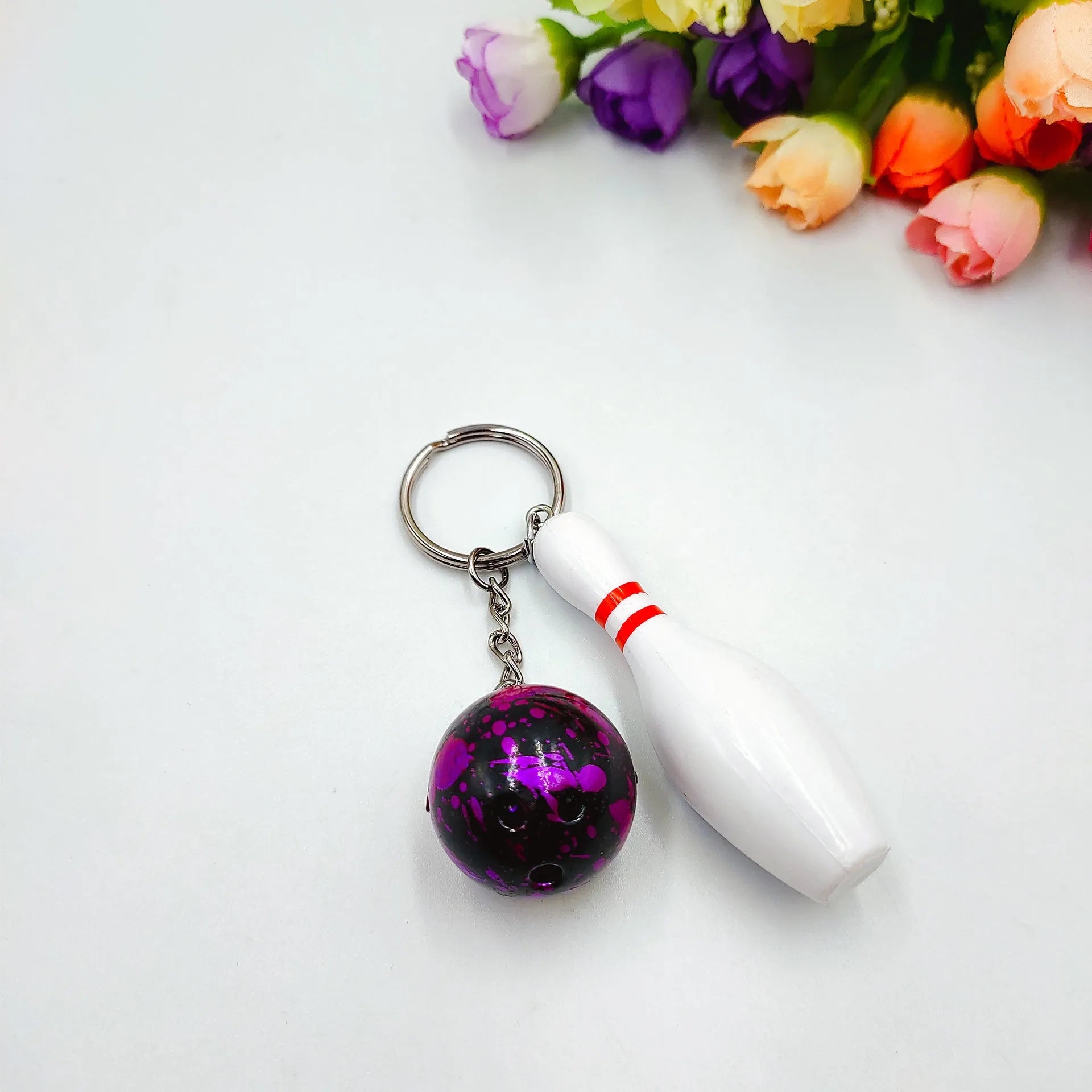 Miniature bowling alley simulation keychain pendant in blue colour with metal key ring