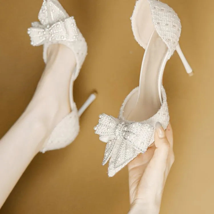 Women's pointed toe pumps with side bow, rhinestone and hollow detail in beige or black, sizes 35-40