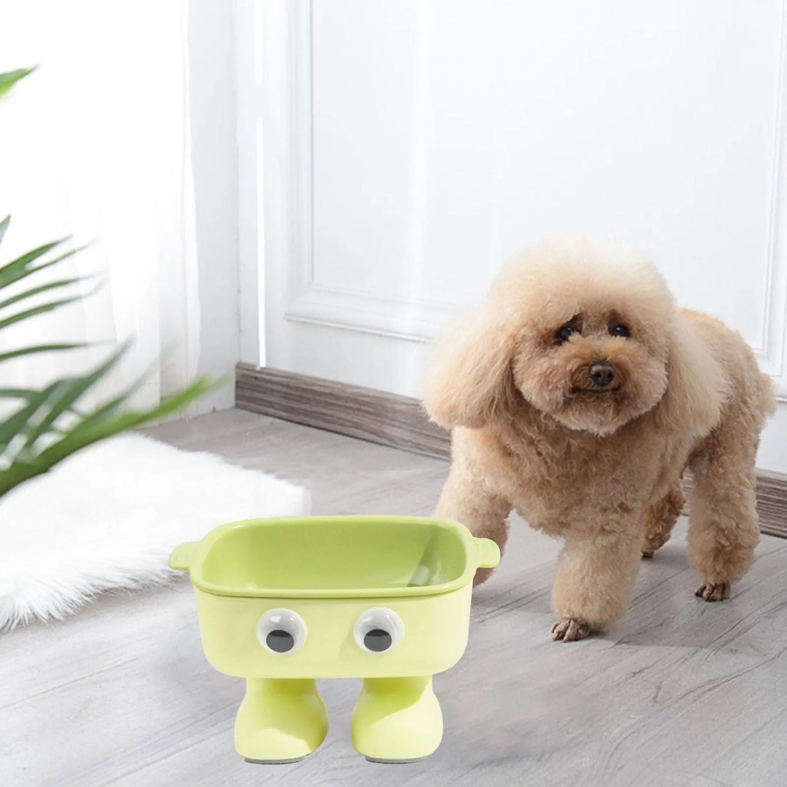 Elevated cat bowl with robot shape, 15° tilt angle, and anti-slip base for pet feeding