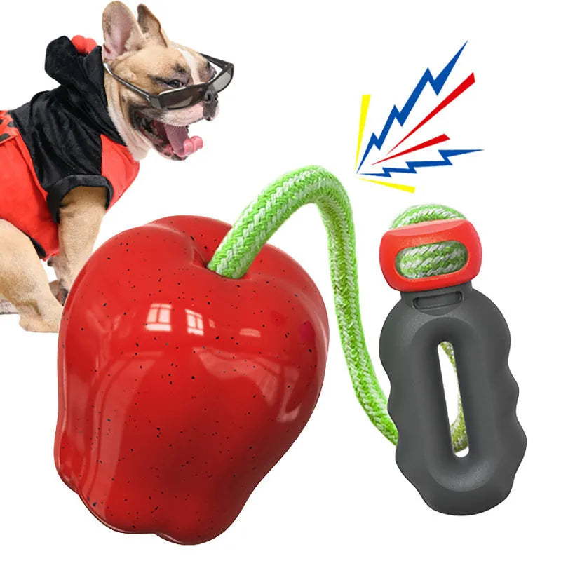 Plastic dog molar toy with food dropping ball in green apple colour for outdoor enrichment