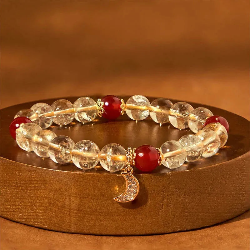 Citrine Red Agate Moon Boom Bracelet showing crystal stones and celestial charms