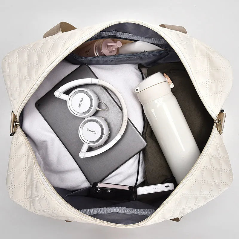 Oxford cloth leisure travel bag in a solid colour with a 36-55L capacity.