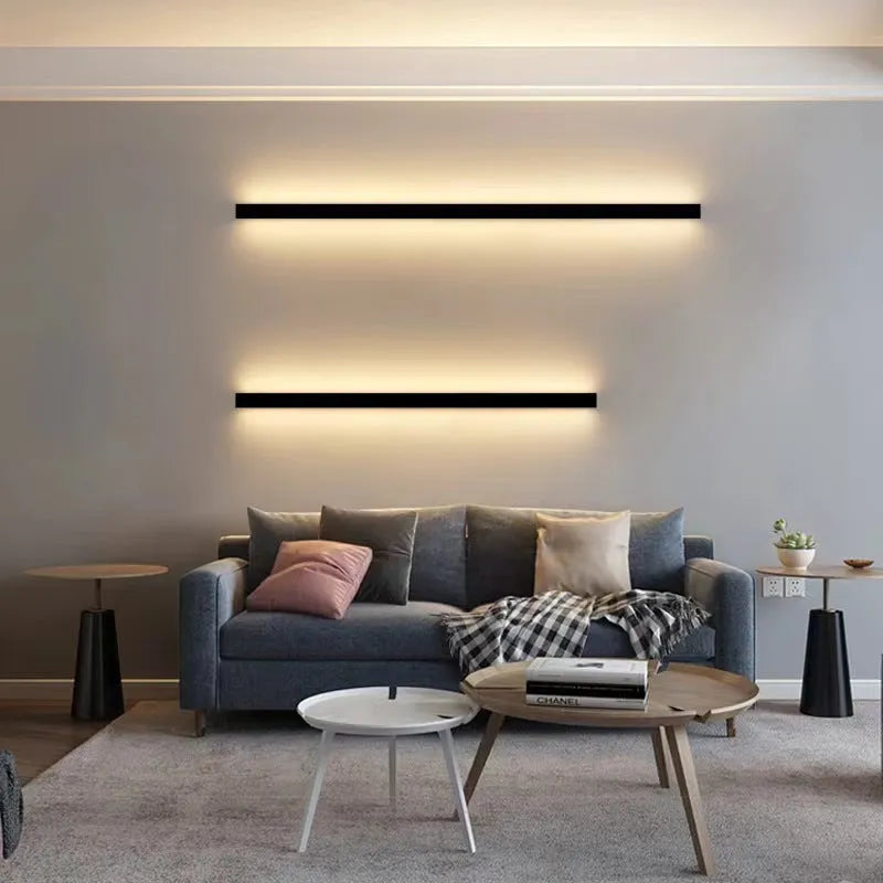 80cm long black linear LED wall lamp with touch control for three light colours on a plain wall.