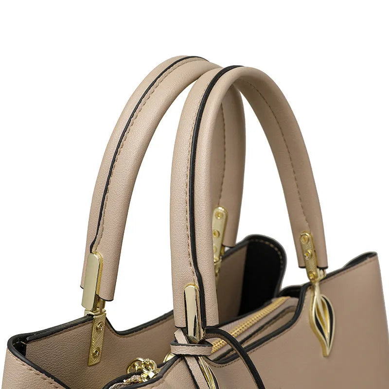 Women's PU leather messenger bag with multiple compartments and adjustable shoulder strap