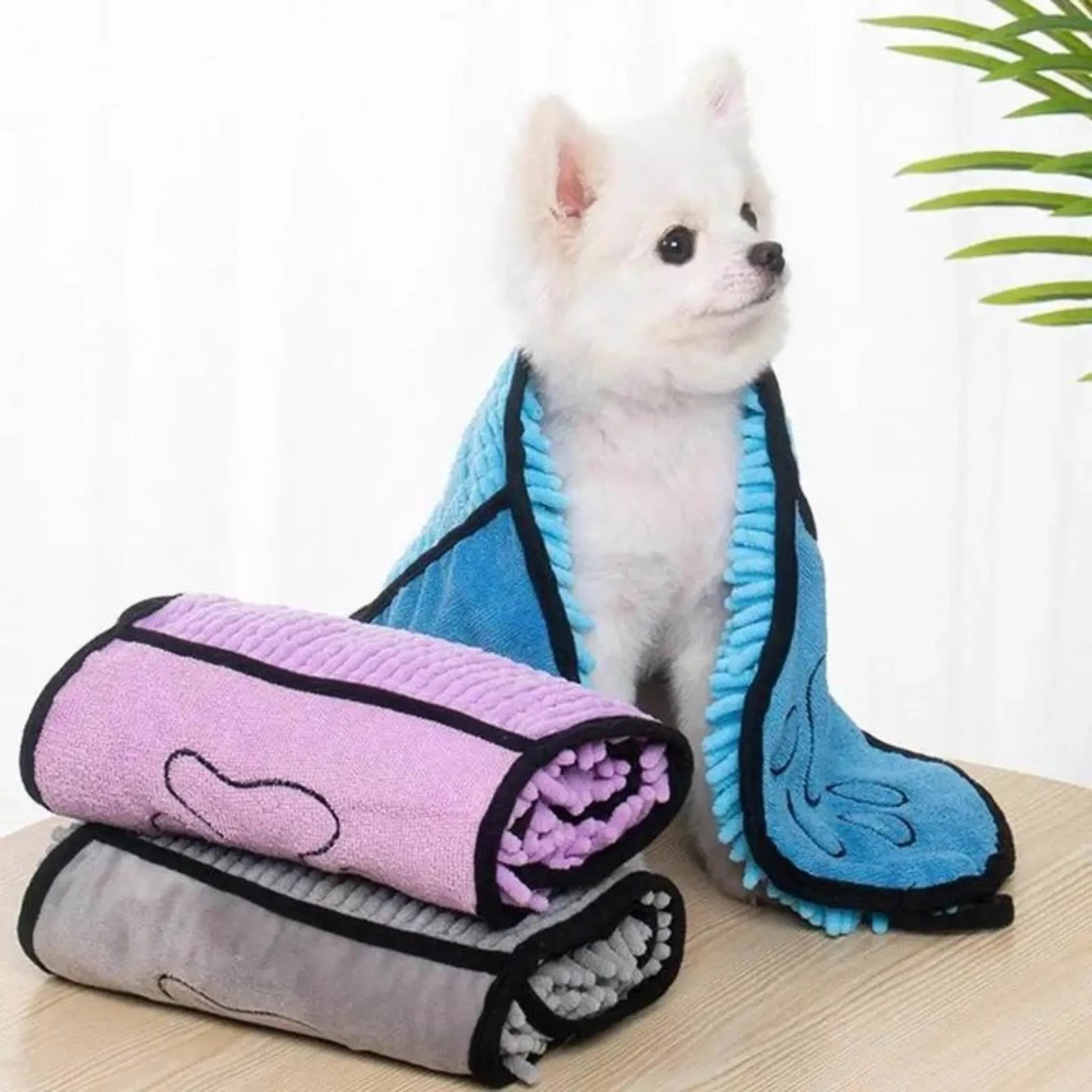 Blue microfibre pet bath towel for drying dogs and cats, showing robe-style design
