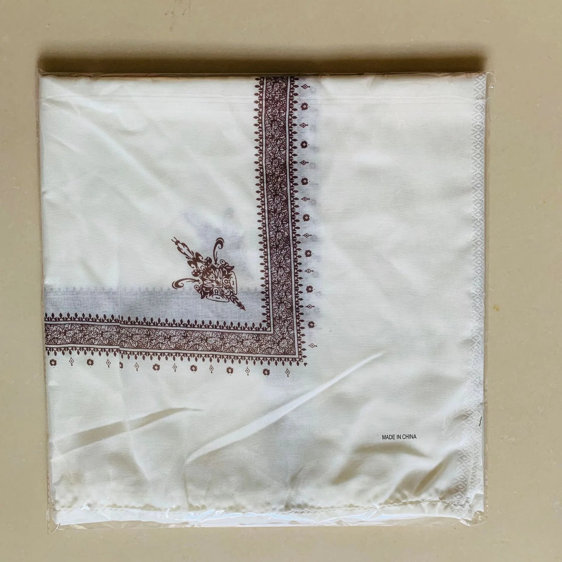 Printed square polyester scarf in six colour options measuring 138cm x 138cm